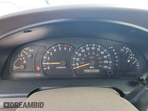 2000 Toyota Tundra SR5 with VIN 5TBKT4412YS057926, listed as a Copart auction lot 80147765 with 189,851 mi miles and Salvage title. Bid and sale history available at DreamBid. Image 9.