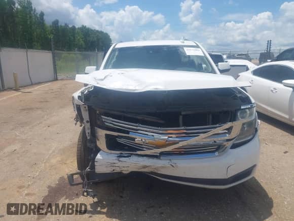 2015 Chevrolet Suburban LT z VIN 1GNSCJKC3FR598528, wystawiony jako IAAI lot #42572084 z przebiegiem 135 002 mil mil oraz . Historia ofert i sprzedaży dostępna na DreamBid. Obrazek 6.