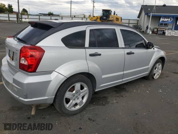 2008 Dodge Caliber SXT with VIN 1B3HB48B38D754624, listed as a Copart auction lot 84799085 with 137,663 mi miles and Salvage title. Bid and sale history available at DreamBid. Image 3.