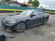 2024 BMW i4 xDrive40 with VIN WBY83FB09RFS54860, listed as a Copart auction lot 59111825 with 12,006 mi miles and Salvage title. Bid and sale history available at DreamBid. Image 1.