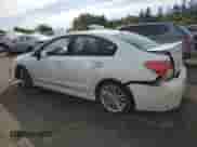 2014 Subaru Impreza Premium with VIN JF1GJAD67EH020048, listed as a Copart auction lot 70721245 with 156,661 mi miles and Salvage title. Bid and sale history available at DreamBid. Image 2.