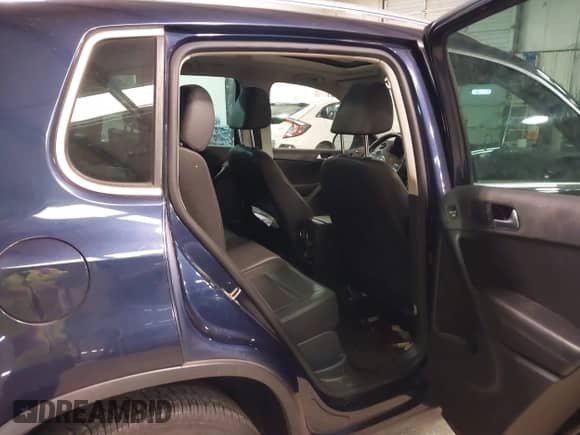 2014 Volkswagen Tiguan SEL with VIN WVGAV3AX8EW563008, listed as a IAAI auction lot 41356523 with 138,211 mi miles and . Bid and sale history available at DreamBid. Image 8.