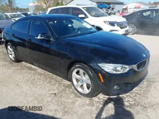 2015 BMW 4 Series 428i xDrive z VIN WBA4C9C55FD331661, wystawiony jako IAAI lot #43446264 z przebiegiem 71 153 mil mil oraz . Historia ofert i sprzedaży dostępna na DreamBid. Obrazek 1.