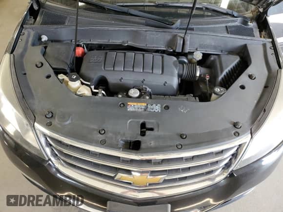 2014 Chevrolet Traverse LT с VIN 1GNKVHKD0EJ346325, выставлен на аукционе Copart как лот 71090205 с пробегом 156 432 миль миль и Списание • Salvage title. История ставок и продаж доступна на DreamBid. Изображение 12.