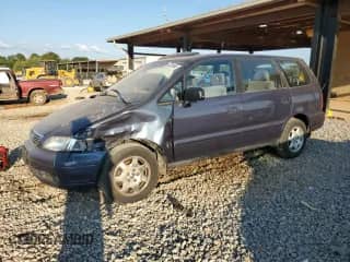 1995 Honda Odyssey EX with VIN JHMRA1879SC013910, listed as a Copart auction lot 63236565 with 262,268 mi miles and Salvage title. Bid and sale history available at DreamBid. Image 1.
