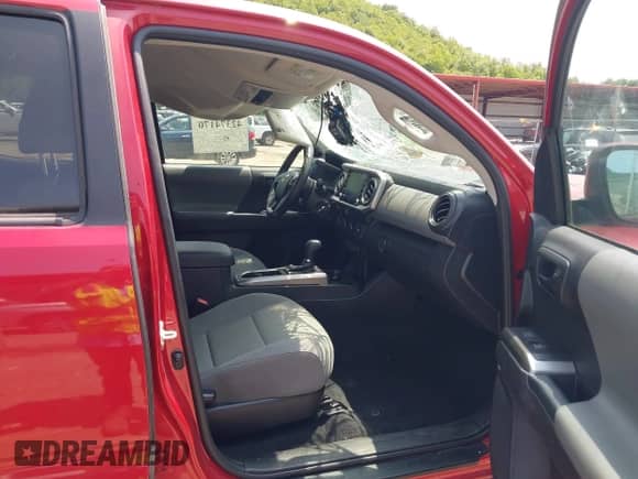 2021 Toyota Tacoma SR5 z VIN 3TYDZ5BN1MT002232, wystawiony jako IAAI lot #42374170 z przebiegiem 16 465 mil mil oraz . Historia ofert i sprzedaży dostępna na DreamBid. Obrazek 5.
