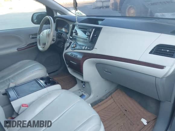 2012 Toyota Sienna XLE with VIN 5TDDK3DC6CS040442, listed as a IAAI auction lot 40899461 with 174,738 mi miles and . Bid and sale history available at DreamBid. Image 5.