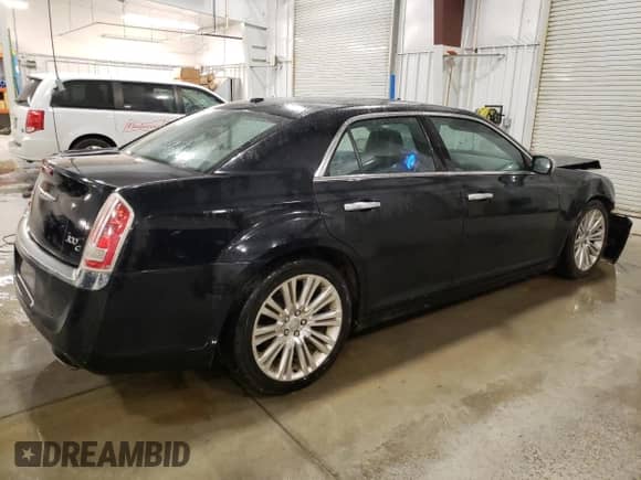 2013 Chrysler 300 C с VIN 2C3CCAET1DH711645, выставлен на аукционе Copart как лот 52899625 с пробегом 122 063 миль миль и На запчасти • Non repairable. История ставок и продаж доступна на DreamBid. Изображение 3.