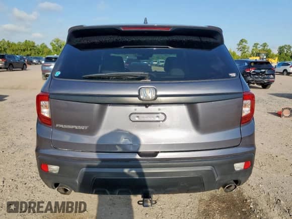 2021 Honda Passport EX-L с VIN 5FNYF7H53MB006604, выставлен на аукционе Copart как лот 68888525 с пробегом 101 282 миль миль и Списание • Salvage title. История ставок и продаж доступна на DreamBid. Изображение 6.