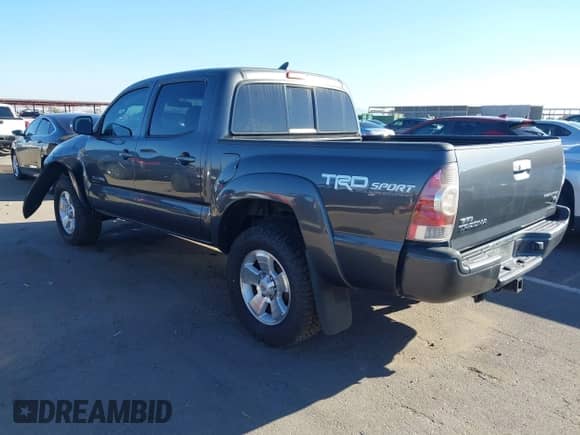 2015 Toyota Tacoma PreRunner z VIN 3TMJU4GN0FM185366, wystawiony jako IAAI lot #43316251 z przebiegiem 77 520 mil mil oraz . Historia ofert i sprzedaży dostępna na DreamBid. Obrazek 3.