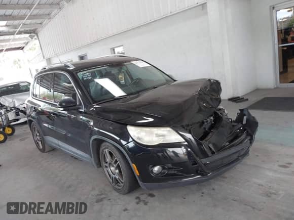 2011 Volkswagen Tiguan SE with VIN WVGAV7AX1BW549681, listed as a IAAI auction lot 40772939 with 157,547 mi miles and . Bid and sale history available at DreamBid. Image 13.