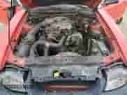 2000 Ford Mustang z VIN 1FAFP404XYF203704, wystawiony jako Copart lot #82164785 z przebiegiem 250 248 mil mil oraz Szkoda całkowita • Salvage title. Historia ofert i sprzedaży dostępna na DreamBid. Obrazek 11.