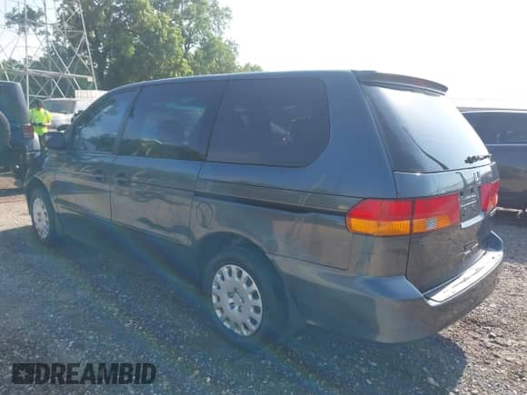 2004 Honda Odyssey LX with VIN 5FNRL18504B126077, listed as a IAAI auction lot 42568123 with 139,930 mi miles and . Bid and sale history available at DreamBid. Image 3.