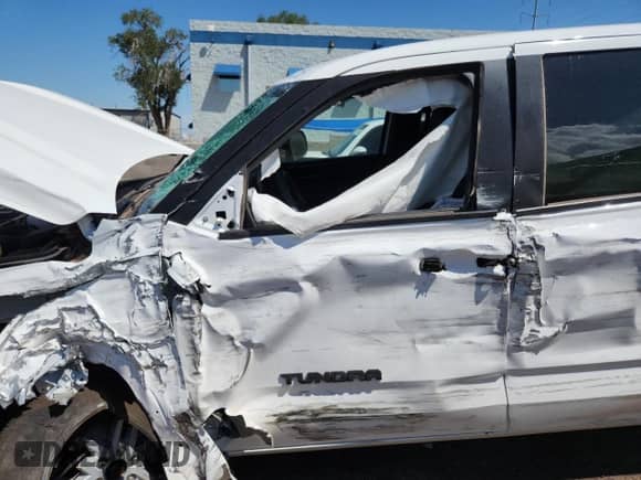 2025 Toyota Tundra SR with VIN 5TFLA5DB9SX315019, listed as a Copart auction lot 69427205 with Not provided miles and Salvage title. Bid and sale history available at DreamBid. Image 7.