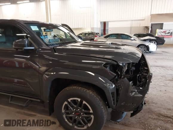 2024 Toyota Tacoma SR5 with VIN 3TMLB5JN9RM067351, listed as a IAAI auction lot 41529043 with 3,054 mi miles and . Bid and sale history available at DreamBid. Image 21.