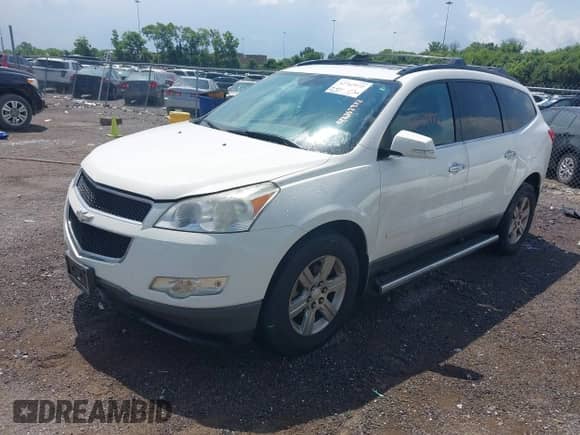 2012 Chevrolet Traverse 2LT with VIN 1GNKRJED5CJ206940, listed as a IAAI auction lot 42762972 with 115,634 mi miles and . Bid and sale history available at DreamBid. Image 2.