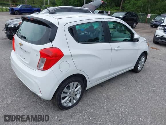 2018 Chevrolet Spark LT with VIN KL8CD6SA7JC456256, listed as a IAAI auction lot 42728353 with 53,864 mi miles and . Bid and sale history available at DreamBid. Image 4.