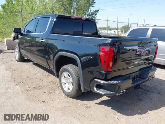 2021 GMC Sierra 1500 Denali z VIN 3GTU9FETXMG422324, wystawiony jako IAAI lot #43121547 z przebiegiem 55 757 mil mil oraz . Historia ofert i sprzedaży dostępna na DreamBid. Obrazek 3.