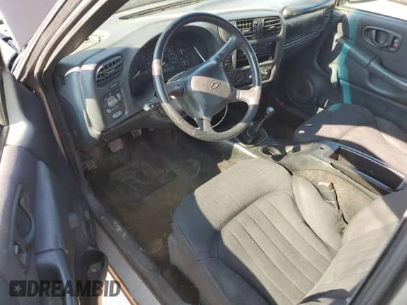 2003 Chevrolet S-10 with VIN 1GCCS14X238186585, listed as a Copart auction lot 67506755 with 179,700 mi miles and Salvage title. Bid and sale history available at DreamBid. Image 8.