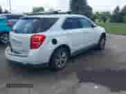 2016 Chevrolet Equinox LT z VIN 2GNALCEK1G1179694, wystawiony jako IAAI lot #42983144 z przebiegiem 137 009 mil mil oraz . Historia ofert i sprzedaży dostępna na DreamBid. Obrazek 4.