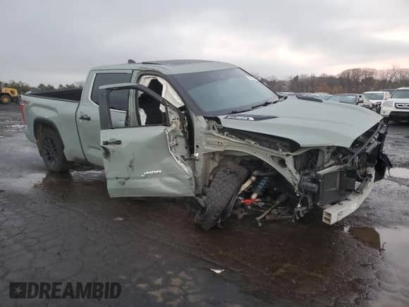 2023 Toyota Tundra Limited Hybrid with VIN 5TFJC5EC1PX002952, listed as a Copart auction lot 77979614 with Not provided miles and Salvage title. Bid and sale history available at DreamBid. Image 4.