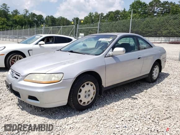 2001 Honda Accord LX z VIN 1HGCG32431A021870, wystawiony jako Copart lot #61724805 z przebiegiem 179 866 mil mil oraz Czysty tytuł • Clean title. Historia ofert i sprzedaży dostępna na DreamBid. Obrazek 1.
