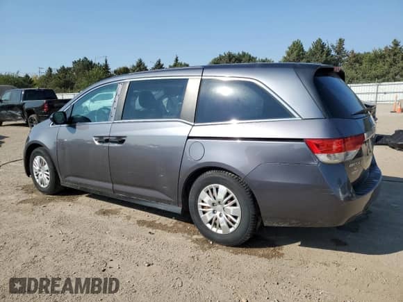 2014 Honda Odyssey LX z VIN 5FNRL5H25EB073844, wystawiony jako Copart lot #71624895 z przebiegiem 169 387 mil mil oraz Szkoda całkowita • Salvage title. Historia ofert i sprzedaży dostępna na DreamBid. Obrazek 2.