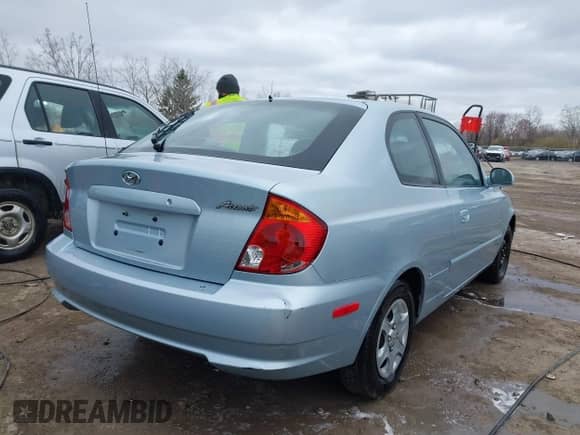 2003 Hyundai Accent GL с VIN KMHCG35C23U264360, выставлен на аукционе IAAI как лот 42033316 с пробегом 100 991 миль миль и . История ставок и продаж доступна на DreamBid. Изображение 4.