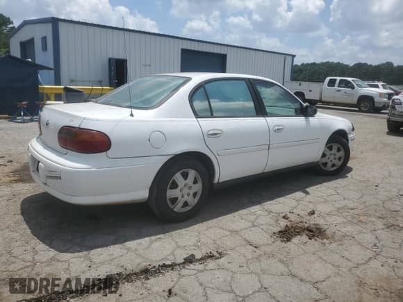 2005 Chevrolet Malibu Classic z VIN 1G1ND52F55M129272, wystawiony jako Copart lot #57944885 z przebiegiem 287 486 mil mil oraz Czysty tytuł • Clean title. Historia ofert i sprzedaży dostępna na DreamBid. Obrazek 3.