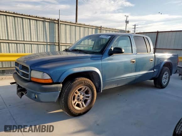 2003 Dodge Dakota Sport with VIN 1D7HL38N73S259725, listed as a Copart auction lot 85151595 with 205,691 mi miles and Salvage title. Bid and sale history available at DreamBid. Image 1.