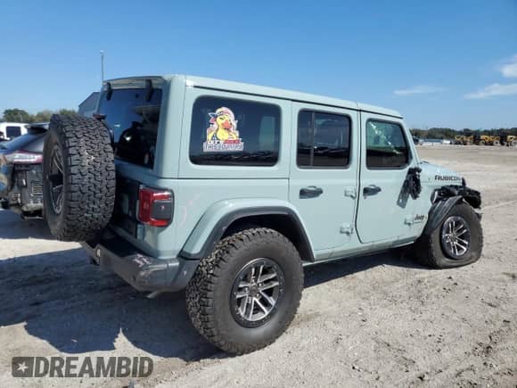 2024 Jeep Wrangler Rubicon 392 with VIN 1C4RJXSJ0RW290589, listed as a Copart auction lot 43072665 with 10,402 mi miles and Salvage title. Bid and sale history available at DreamBid. Image 3.