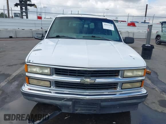 1998 Chevrolet Suburban with VIN 3GNEC16R5WG108019, listed as a IAAI auction lot 41537378 with 245,561 mi miles and . Bid and sale history available at DreamBid. Image 12.