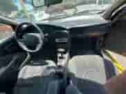 2001 Saturn SC с VIN 1G8ZY12771Z105142, выставлен на аукционе Copart как лот 67220545 с пробегом 166 396 миль миль и Чистый • Clean title. История ставок и продаж доступна на DreamBid. Изображение 9.