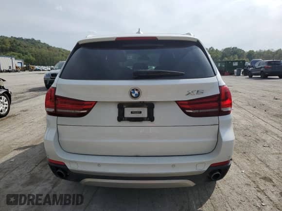 2017 BMW X5 xDrive35i with VIN 5UXKR0C5XH0U50500, listed as a Copart auction lot 84577295 with 105,740 mi miles and Salvage title. Bid and sale history available at DreamBid. Image 6.