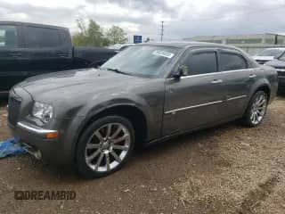 2008 Chrysler 300 C Hemi with VIN 2C3LA63H08H209927, listed as a Copart auction lot 58026635 with 169,522 mi miles and Salvage title. Bid and sale history available at DreamBid. Image 1.