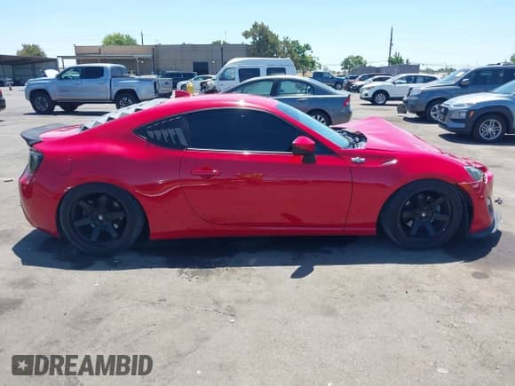 2016 Scion FR-S z VIN JF1ZNAA12G9707778, wystawiony jako IAAI lot #42909233 z przebiegiem 70 648 mil mil oraz . Historia ofert i sprzedaży dostępna na DreamBid. Obrazek 13.