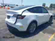 2023 Tesla Model Y Long Range с VIN 7SAYGDEE8PA034371, выставлен на аукционе IAAI как лот 42765729 с пробегом Не указан миль и . История ставок и продаж доступна на DreamBid. Изображение 4.