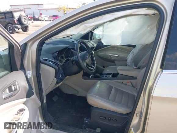 2017 Ford Escape Titanium with VIN 1FMCU0JD7HUE92688, listed as a IAAI auction lot 43171142 with 156,576 mi miles and . Bid and sale history available at DreamBid. Image 5.