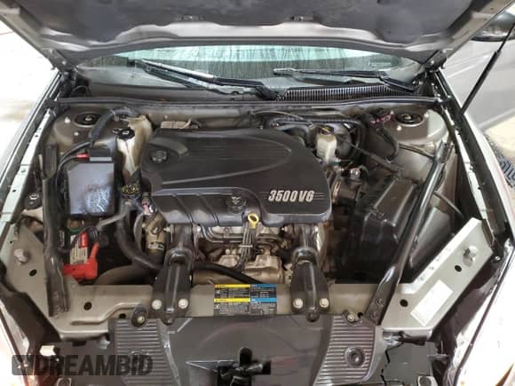 2007 Chevrolet Monte Carlo LS z VIN 2G1WJ15K879419276, wystawiony jako Copart lot #70819755 z przebiegiem 86 065 mil mil oraz Szkoda całkowita • Salvage title. Historia ofert i sprzedaży dostępna na DreamBid. Obrazek 11.