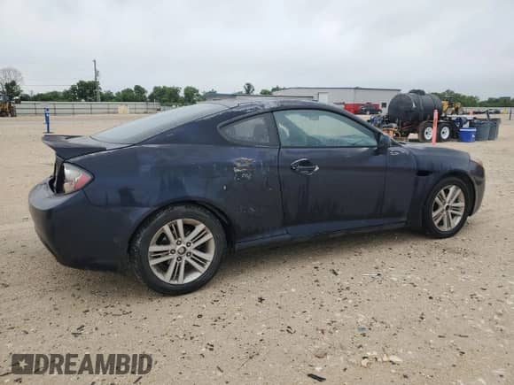 2008 Hyundai Tiburon GS с VIN KMHHM66D28U284008, выставлен на аукционе Copart как лот 55500035 с пробегом 108 084 миль миль и Списание • Salvage title. История ставок и продаж доступна на DreamBid. Изображение 3.