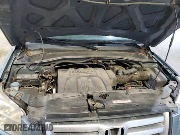 2007 Honda Pilot EX z VIN 2HKYF184X7H520542, wystawiony jako Copart lot #84535735 z przebiegiem 93 936 mil mil oraz Czysty tytuł • Clean title. Historia ofert i sprzedaży dostępna na DreamBid. Obrazek 12.