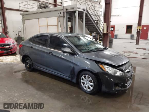 2012 Hyundai Accent GLS z VIN KMHCT4AE9CU084348, wystawiony jako IAAI lot #43230958 z przebiegiem 140 984 mil mil oraz . Historia ofert i sprzedaży dostępna na DreamBid. Obrazek 1.