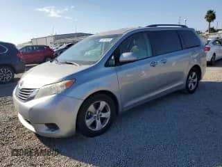 2014 Toyota Sienna LE AAS with VIN 5TDKK3DC0ES512595, listed as a Copart auction lot 81074235 with 148,467 mi miles and Salvage title. Bid and sale history available at DreamBid. Image 1.
