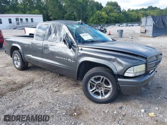 2002 Dodge Dakota with VIN 1B7GL32Z02S676880, listed as a IAAI auction lot 42982180 with 109,819 mi miles and . Bid and sale history available at DreamBid. Image 1.