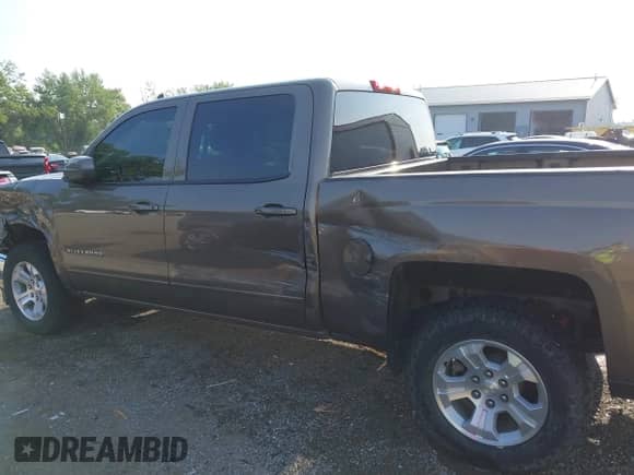 2015 Chevrolet Silverado 1500 LT with VIN 3GCUKREC4FG160244, listed as a IAAI auction lot 42753691 with 152,822 mi miles and . Bid and sale history available at DreamBid. Image 14.