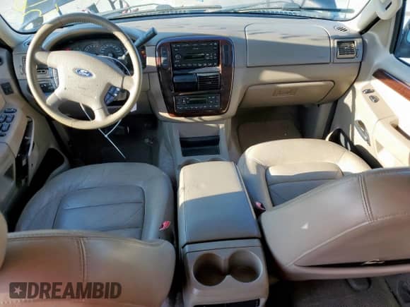 2004 Ford Explorer with VIN 1FMZU65KX4UC05800, listed as a Copart auction lot 58423175 with 129,344 mi miles and Salvage title. Bid and sale history available at DreamBid. Image 8.