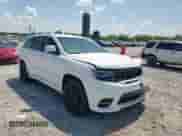 2017 Jeep Grand Cherokee SRT z VIN 1C4RJFDJXHC738652, wystawiony jako Copart lot #61984665 z przebiegiem 108 202 mil mil oraz Szkoda całkowita • Salvage title. Historia ofert i sprzedaży dostępna na DreamBid. Obrazek 14.