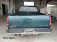 1995 GMC Sierra 1500 z VIN 2GTEC19K2S1558740, wystawiony jako Copart lot #69398185 z przebiegiem 386 899 mil mil oraz Szkoda całkowita • Salvage title. Historia ofert i sprzedaży dostępna na DreamBid. Obrazek 6.