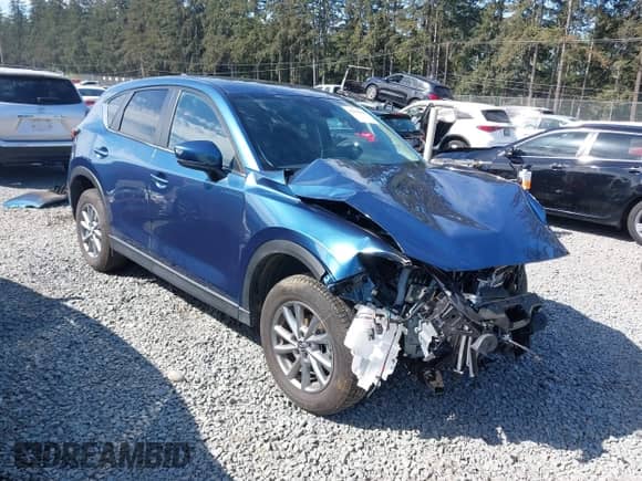 2023 Mazda CX-5 S Preferred z VIN JM3KFBCM9P0258634, wystawiony jako IAAI lot #42224168 z przebiegiem 9 519 mil mil oraz . Historia ofert i sprzedaży dostępna na DreamBid. Obrazek 1.