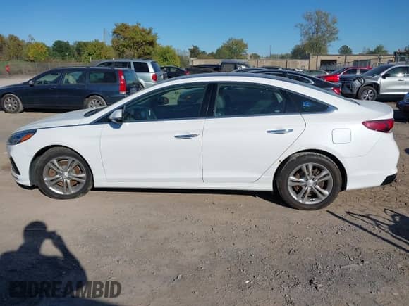 2019 Hyundai Sonata SEL with VIN 5NPE34AF1KH736636, listed as a IAAI auction lot 43329295 with 64,794 mi miles and . Bid and sale history available at DreamBid. Image 14.